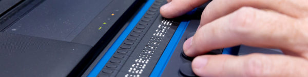Photo: Close-up of hands operating a Braille display. Taken at REHACARE trade fair; Copyright: Andreas Wiese/Messe Düsseldorf