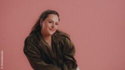 Christine Eggert sits casually on a chair and poses for the camera