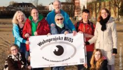 Photo: Members of the association on a construction area; Copyright: Wohnprojekt BliSS