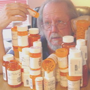 Photo: Man within lots of medication